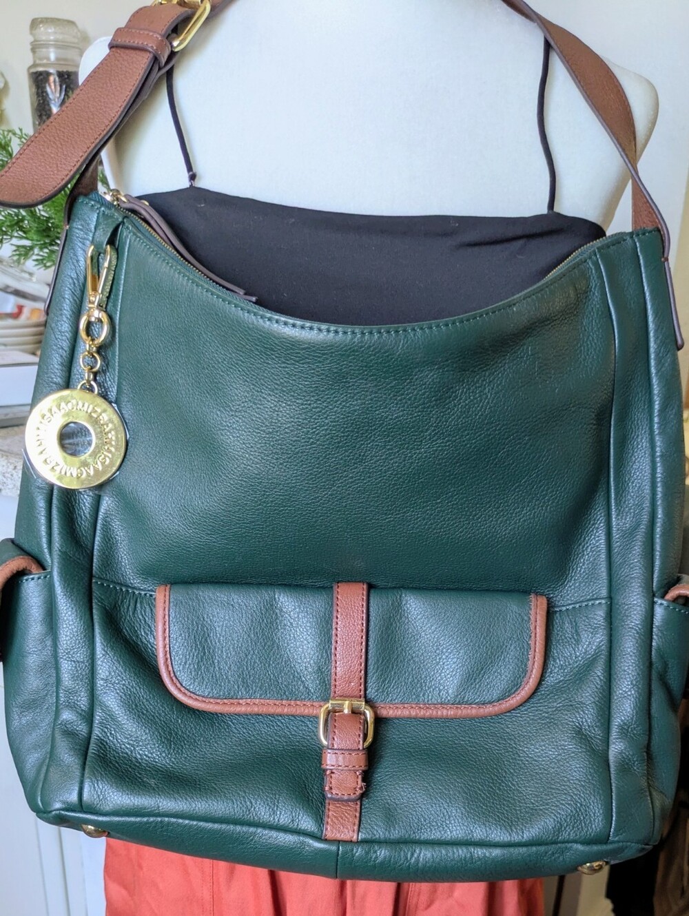 “Isaac Mizrahi pebble leather shoulder bag in a beautiful green/ brown trim